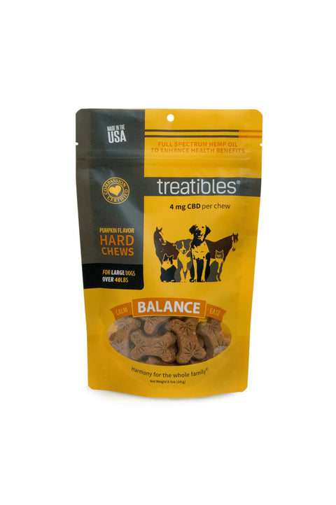 Treatibles Balance hard dog treats, pumpkin flavor, orange and black bag 4mg CBD