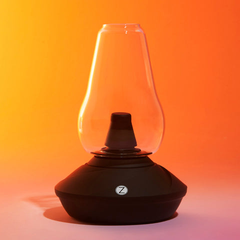 Lifestyle image of a zenco duo device, orange and pink background