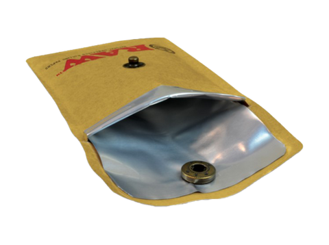 RAW Pocket Ashtray open to show inside and closure snap. tan product with red and black letters, silver inside.