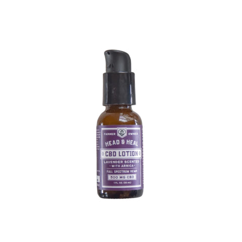 Head and Heal lavender cbd lotion Amber bottle with purple label. 