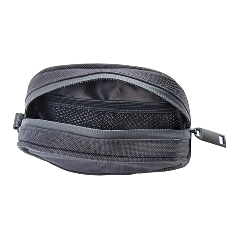 Ooze traveler wristlet in black. Open to show interior features.