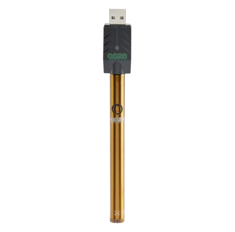 Ooze twist 2.0 510 battery with charger cap. Orange color device.