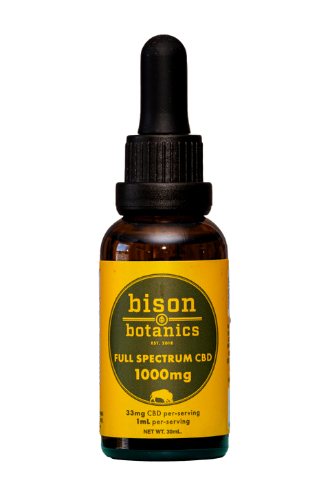 Bison Botanics Full spectrum cbd oil. amber bottle with orange label.