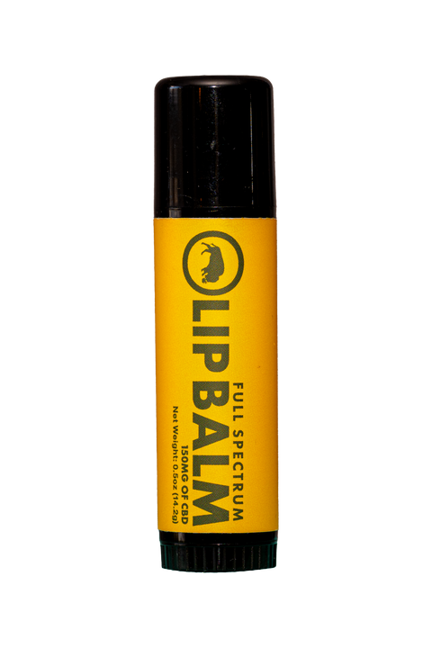 Bison Botanics Full spectrum lip balm - black tube with orange label.