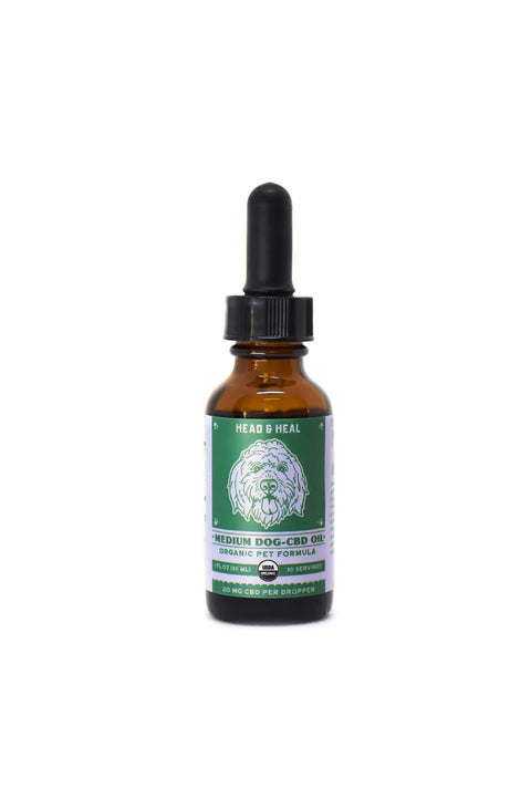 Head and Heal Medium dog pet tincture, green and amber bottle