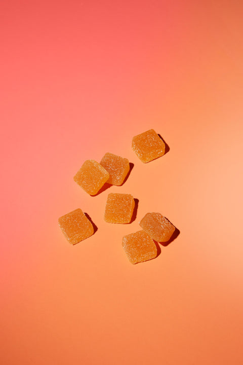 Lifestyle image of gummies on a surface