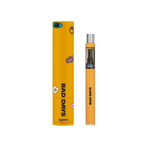 Bad Days Sativa CBD Disposable. 1g unit. Tropicana Cookies Flavor. Yellow packaging and device.