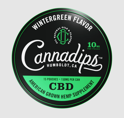 Cannadips Wintergreen CBD Pouches. Black and green circular tin.