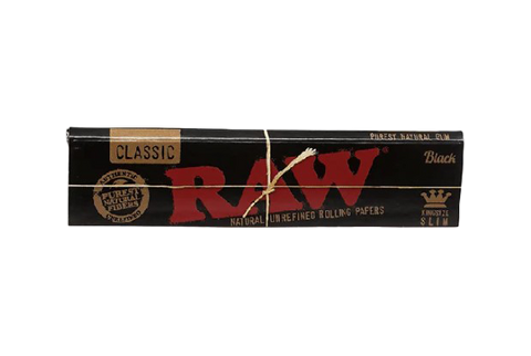 RAW King Size Slim papers. Black package with red letters.