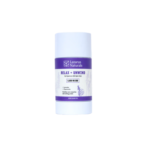 Lazarus Naturals Relax and Unwind CBD Salve stick. 3600mg. White and Purple Container.